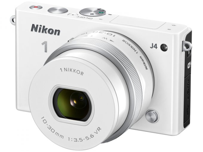 Компактная фотокамера Nikon со сменными объективами (7 фото)