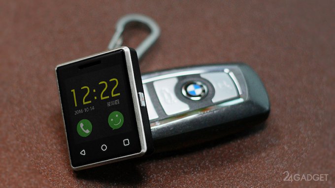 Выпущен самый маленький сенсорный телефон (7 фото)