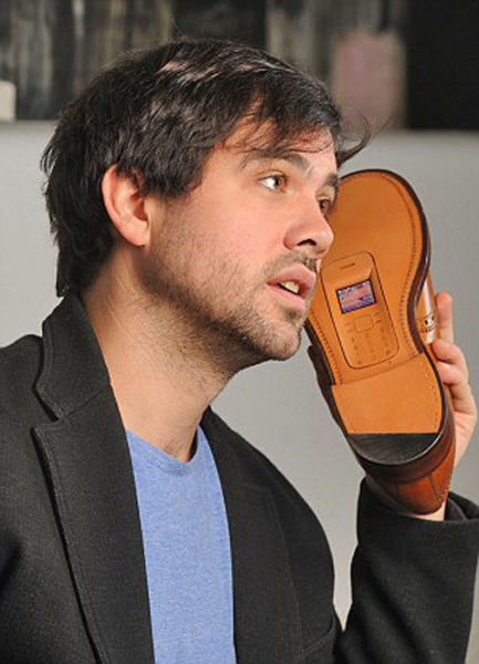 A phone in shoes is a new life of old things (11 photos)