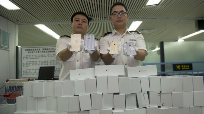 Китайцы украли айфоны на сумму $225000, пробив стену склада