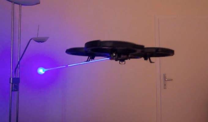 A quadrocopter shooting with a laser (2 photos + video)