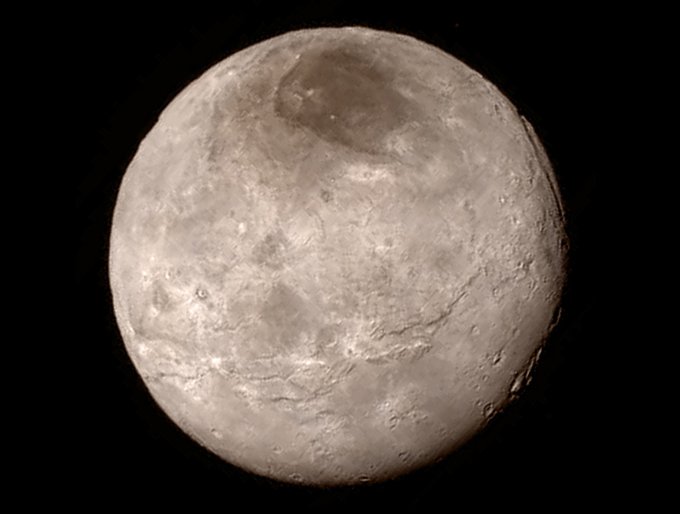 NASA опубликовало новые снимки Плутона и Харона (2 фото)