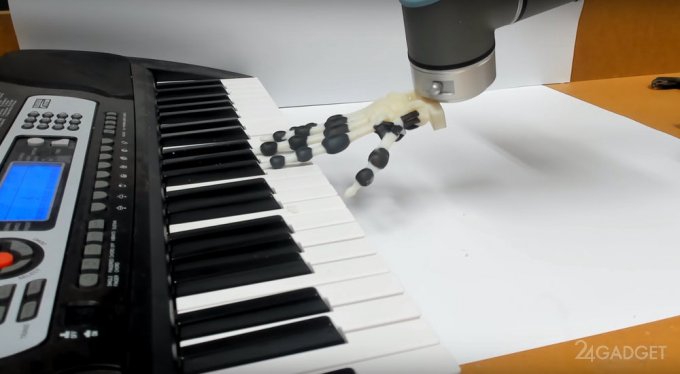 A robotic hand played Jingle Bells on a synthesizer (video)